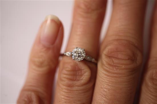 A white gold and single stone diamond ring, size M.
